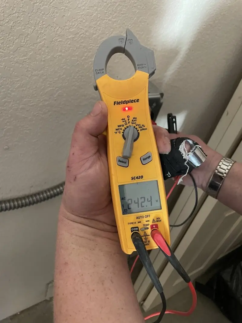Voltage testing with clamp meter during Generator Installation in Alloway